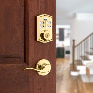 Kwikset 620 in Polished Brass on Exterior