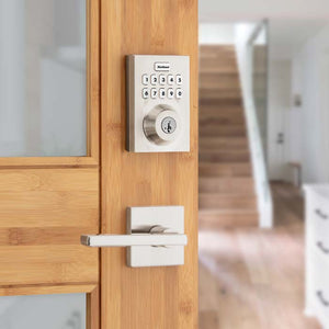 Kwikset keyless smart lock on wood door