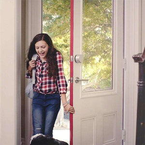 Girl coming home and greeted by dog